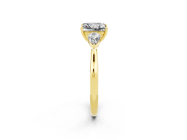 Yellow gold Three-Stone Princess Cut Moissanite Ring with Pear  Side Stones in Four-Prong Setting