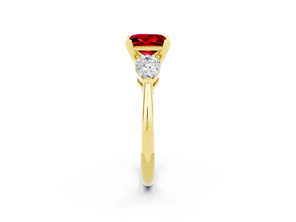Yellow gold Three-Stone Princess Cut Ruby Ring with Pear Side Stones and Four-Prong Setting