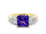 Yellow gold Three-Stone Princess Cut Tanzanite Ring with Pear Side Stones and Four-Prong Setting