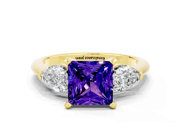 Yellow gold Three-Stone Princess Cut Tanzanite Ring with Pear Side Stones and Four-Prong Setting
