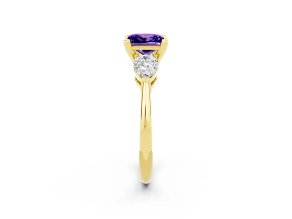 Yellow gold Three-Stone Princess Cut Tanzanite Ring with Pear Side Stones and Four-Prong Setting