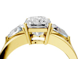 Yellow gold Three-Stone Radiant Cut Cut Diamond Ring with Trillion Side Stones on a Split Shank Band_13