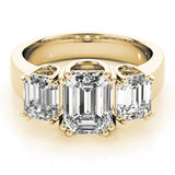 14K Yellow Gold Three-Stone 2.06 Carat D VS1 Emerald Cut Diamond Ring with Channel Set Band and Four-Prong Setting