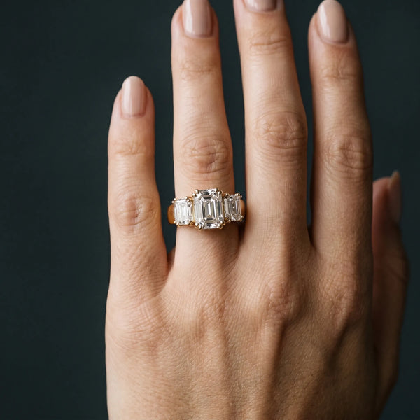 Yellow gold Three-Stone Radiant Cut Diamond Ring with Channel Set Band and Four-Prong Setting