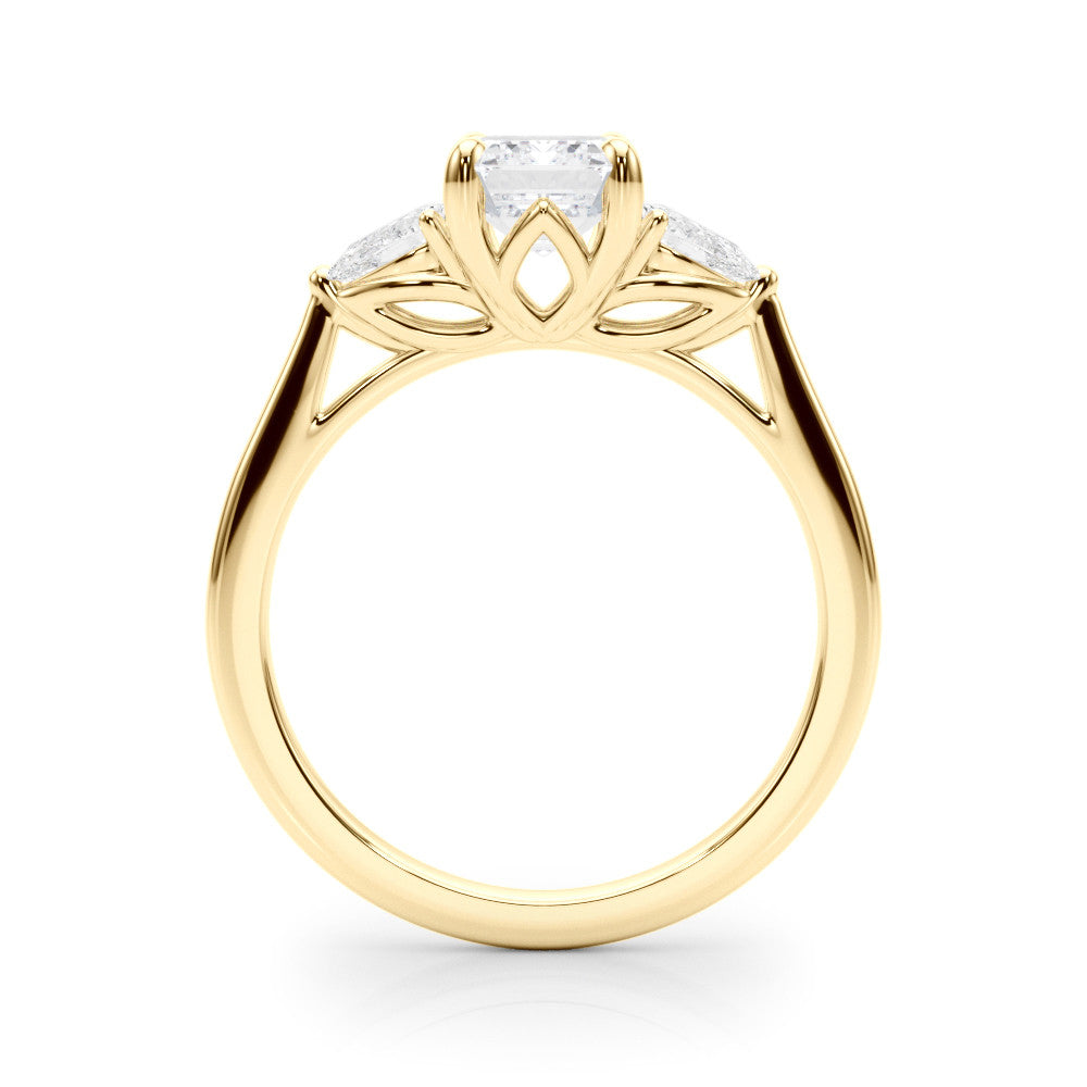 Yellow gold Three-Stone Radiant Cut Diamond Ring with Pear Side Stones on a Platinum Band and Four-Prong Setting