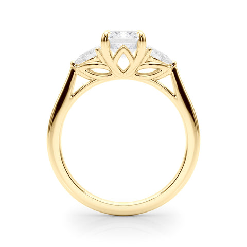 Yellow gold Three-Stone Radiant Cut Diamond Ring with Pear Side Stones on a Platinum Band and Four-Prong Setting