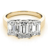 14K Yellow Gold Three-Stone 4.069999999999999 Carat F VS1 Cushion Cut Diamond Ring with Prong Setting and Classic Band