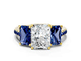 Yellow gold Three-Stone Radiant Cut Diamond Ring with Round with Blue Sapphire side stone Pavé Band and Prong Setting