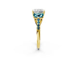 Yellow gold Three-Stone Radiant Cut Diamond Ring with Round with Blue Topaz side stone Pavé Band and Prong Setting_2