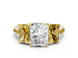 Yellow gold Three-Stone Radiant Cut Diamond Ring with Round with Yellow Sapphire side stone Pavé Band and Prong Setting