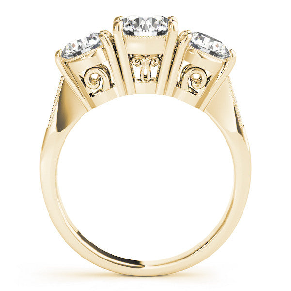 Yellow gold Three-Stone Emerald Diamond Engagement Ring with Prong Setting on a Classic Band