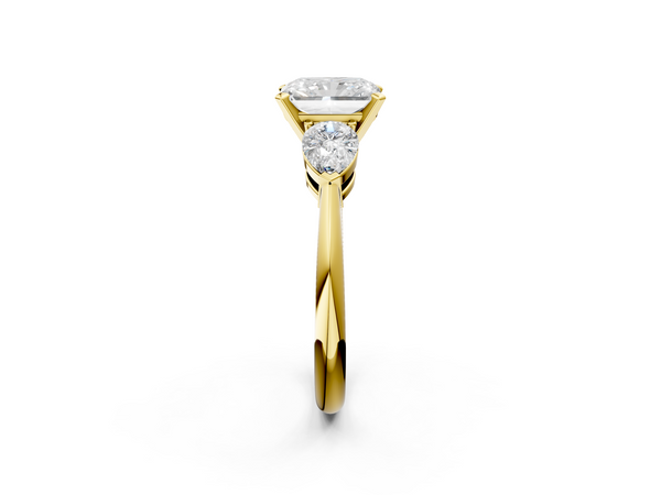 18K Yellow Gold Three-Stone 4.05 Carat E VVS2 Radiant Diamond Ring with Pear Side Stones and Four-Prong Setting