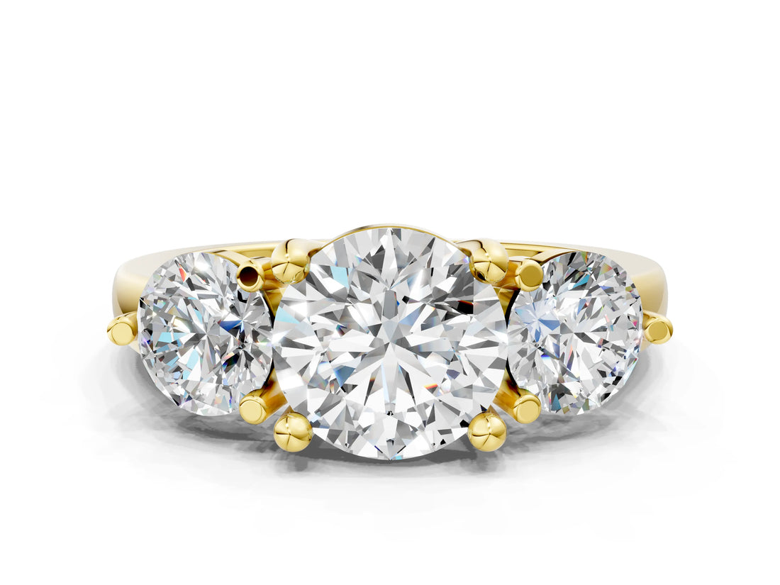 Yellow gold Three-Stone Round Brilliant Cut Solitaire Ring with Prong Setting on a Classic Band