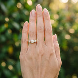 14K Yellow Gold Three-Stone 1.01 Carat F VVS2 Round Brilliant Diamond Ring with Channel Setting and White Gold Band