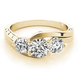 Yellow gold Three-Stone Round Brilliant Split Shank Prong Set Ring 1