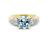 Yellow gold Three-Stone Round Cut Aquamarine Ring with Pear Side Stones and Four-Prong Setting