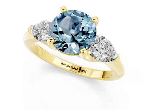 Yellow gold Three-Stone Round Cut Aquamarine Ring with Pear Side Stones and Four-Prong Setting_1