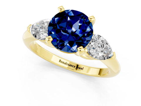Yellow gold Three-Stone Round Cut Blue Sapphire Ring with Pear Side Stones and Four-Prong Setting_1