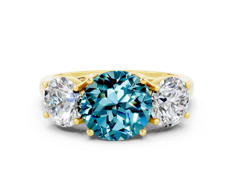 Yellow gold Three-Stone Round Cut Blue Topaz Engagement Ring with Prong Setting