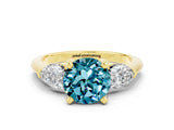 Yellow gold Three-Stone Round Cut Blue Topaz Ring with Pear Side Stones and Four-Prong Setting