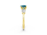 Yellow gold Three-Stone Round Cut Blue Topaz Ring with Pear Side Stones and Four-Prong Setting_2