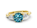 Yellow gold Three-Stone Round Cut Blue Topaz Ring with Pear  Side Stones in Four-Prong Setting_25