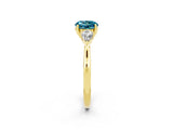 Yellow gold Three-Stone Round Cut Blue Topaz Ring with Pear  Side Stones in Four-Prong Setting_51