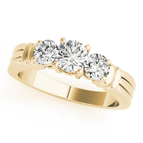 Yellow gold Three-Stone Round Cut Channel Set Diamond Ring with Four-Prong Setting