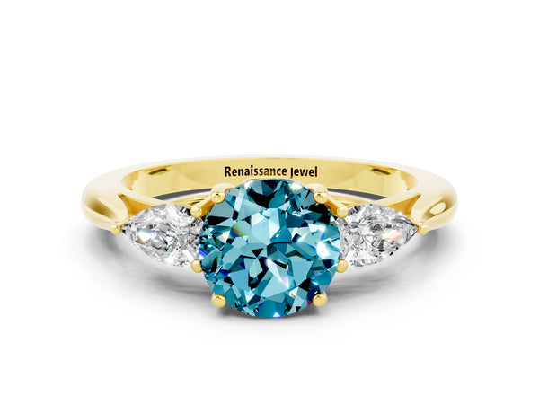 Yellow gold Three-Stone Round Cut Cut Diamond Ring with Pear Side Stones in Four-Prong Setting