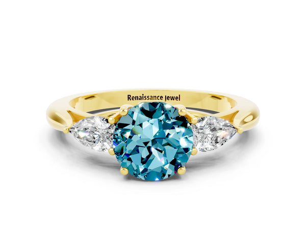 Yellow gold Three-Stone Round Cut Cut Diamond Ring with Pear Side Stones in Four-Prong Setting