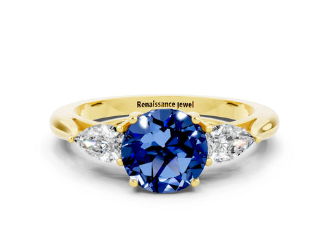 Yellow gold Three-Stone Round Cut Cut Diamond Ring with Pear Side Stones in Four-Prong Setting