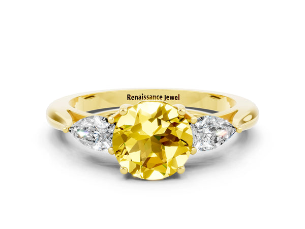 Yellow gold Three-Stone Round Cut Yellow Sapphire Ring with Pear  Side Stones in Four-Prong Setting