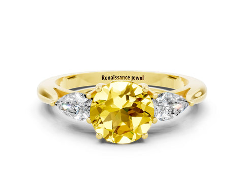 Yellow gold Three-Stone Round Cut Cut Diamond Ring with Pear Side Stones in Four-Prong Setting