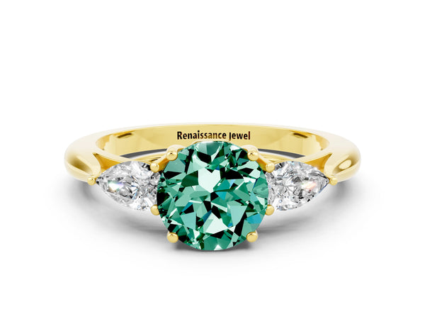 Yellow gold Three-Stone Round Cut Green Sapphire Ring with Pear  Side Stones in Four-Prong Setting