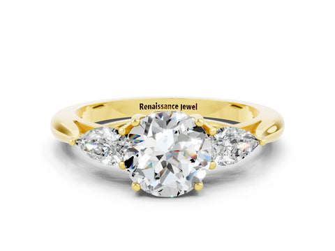Yellow gold Three-Stone Round Cut Cut Diamond Ring with Pear Side Stones in Four-Prong Setting