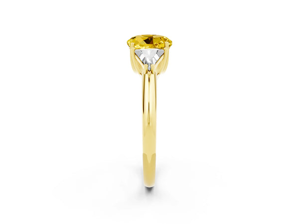 Yellow gold Three-Stone Round Cut Yellow Sapphire Engagement Ring with Trillion Side Stones and Prong Setting
