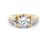 Yellow gold Three-Stone Round Cut Cut Diamond Ring with Trillion Side Stones and Four-Prong Setting