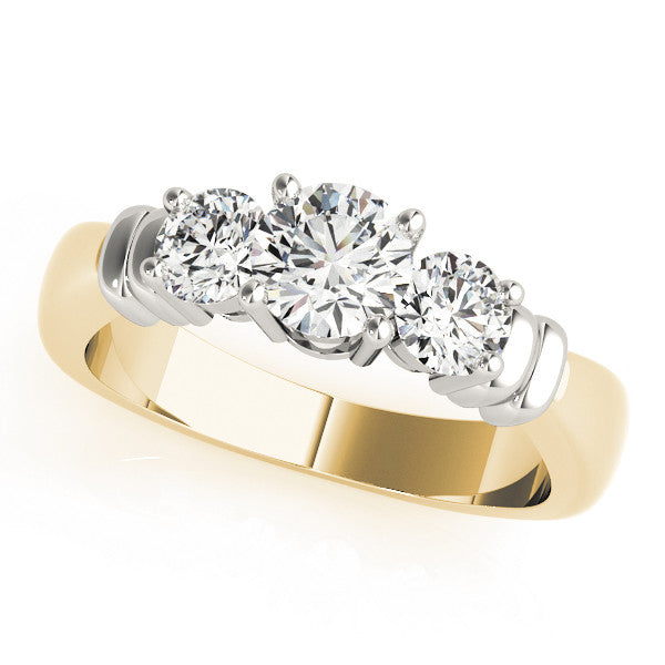 Yellow gold Three-Stone Round Cut Diamond Ring with Channel Band and Prong Setting