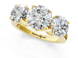 Yellow gold Three-Stone Round Cut Diamond Ring with Channel Set Band and Four-Prong Setting_19