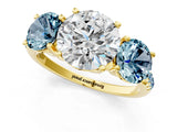 Yellow gold Three-Stone Round Cut Diamond Ring with Round with Aquamarine side stone Pavé Band and Prong Setting_1