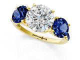Yellow gold Three-Stone Round Cut Diamond Ring with Round with Blue Sapphire side stone Pavé Band and Prong Setting_1