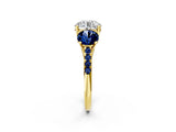Yellow gold Three-Stone Round Cut Diamond Ring with Round with Blue Sapphire side stone Pavé Band and Prong Setting_2