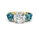 Yellow gold Three-Stone Round Cut Diamond Ring with Round with Blue Topaz side stone Pavé Band and Prong Setting
