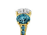 Yellow gold Three-Stone Round Cut Diamond Ring with Round with Blue Topaz side stone Pavé Band and Prong Setting_5
