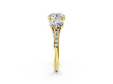 Yellow gold Three-Stone Round Cut Diamond Ring with Round with Moissanite side stone Pavé Band and Prong Setting_2