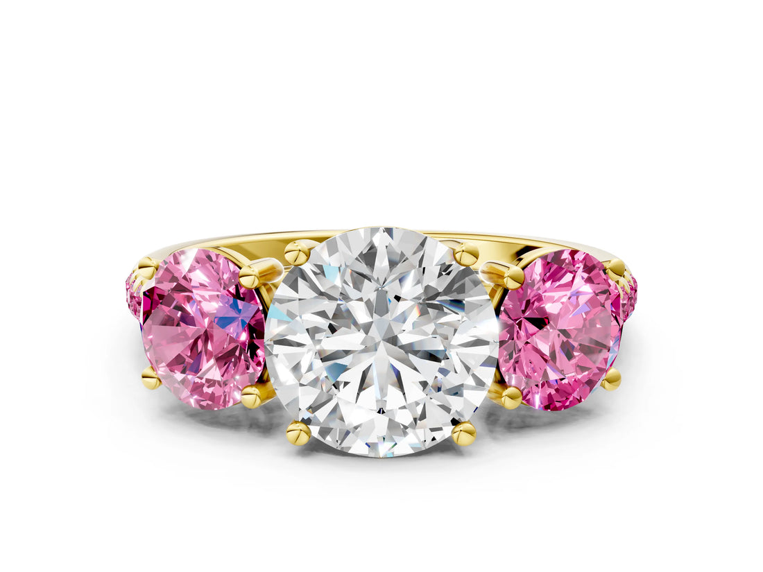 Yellow gold Three-Stone Round Cut Diamond Ring with Round with Pink Sapphire side stone Pavé Band and Prong Setting