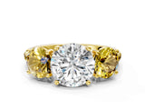 Yellow gold Three-Stone Round Cut Diamond Ring with Round with Yellow Sapphire side stone Pavé Band and Prong Setting
