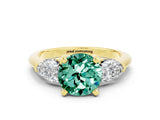 Yellow gold Three-Stone Round Cut Green Sapphire Ring with Pear Side Stones and Four-Prong Setting