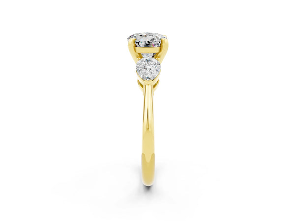 Yellow gold Three-Stone Round Cut Moissanite Ring with Pear Side Stones and Four-Prong Setting