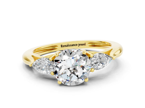Yellow gold Three-Stone Round Cut Moissanite Ring with Pear  Side Stones in Four-Prong Setting
